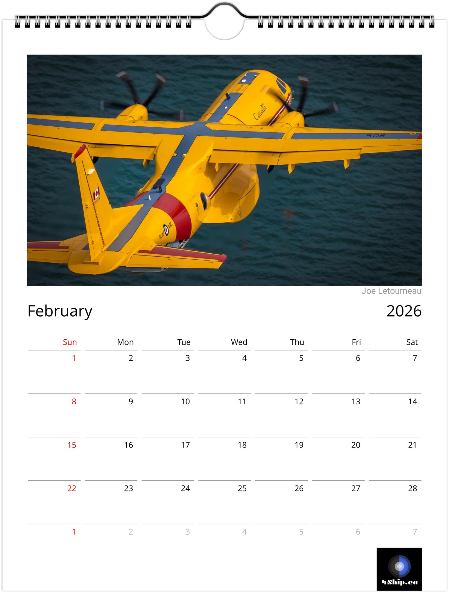 Calendar page for February 2026 featuring a yellow airplane over water.